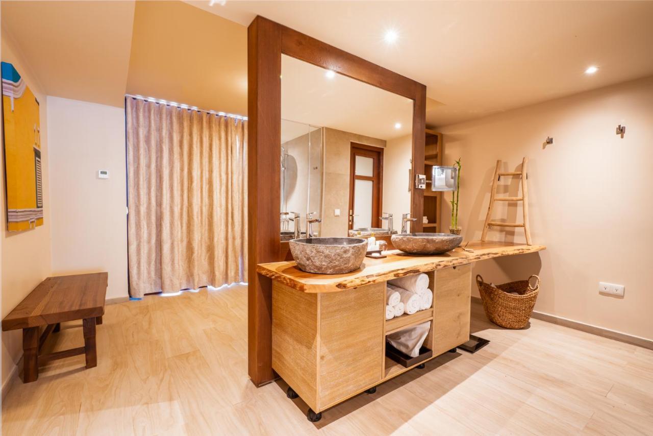 Master Suite with Pool View Queen Beds