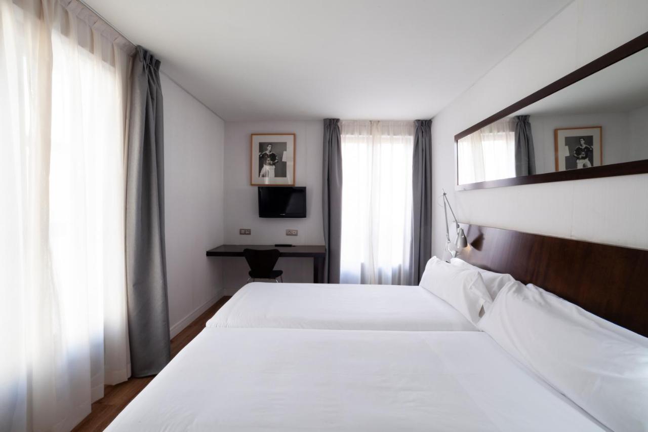 Tweepersoonskamer met 2 Extra Bedden