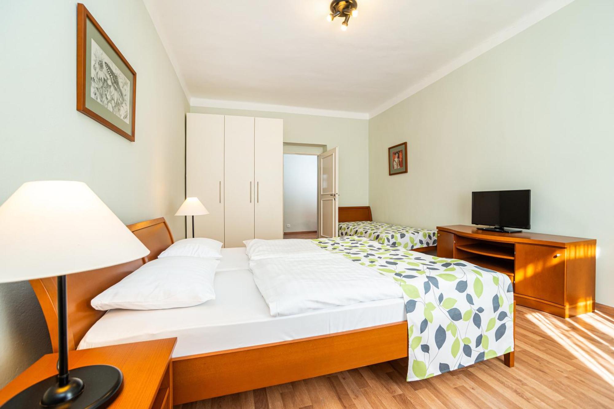 Appartamento Triplo con 1 Camera da Letto