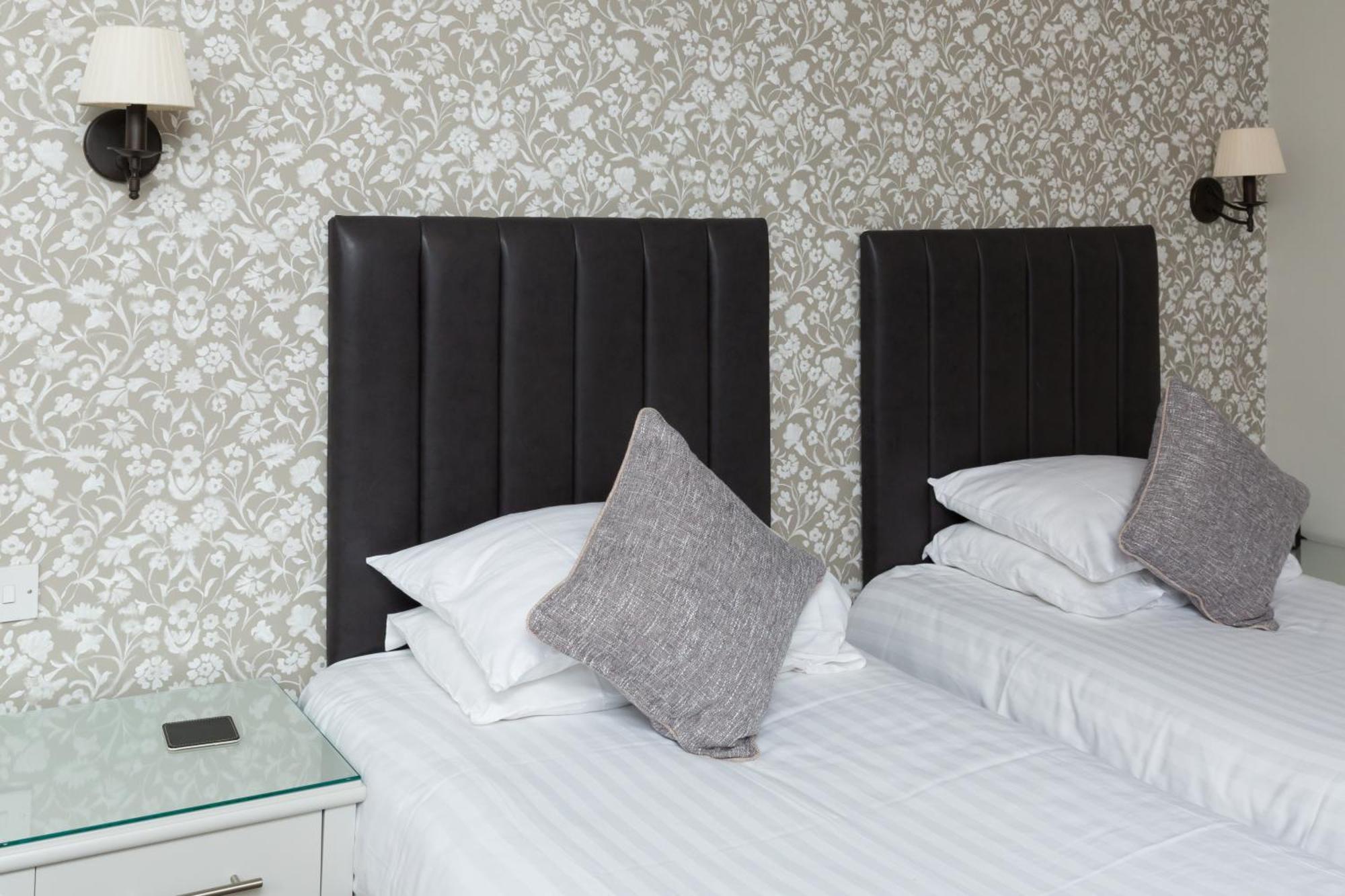 Tweepersoonskamer met 2 Aparte Bedden