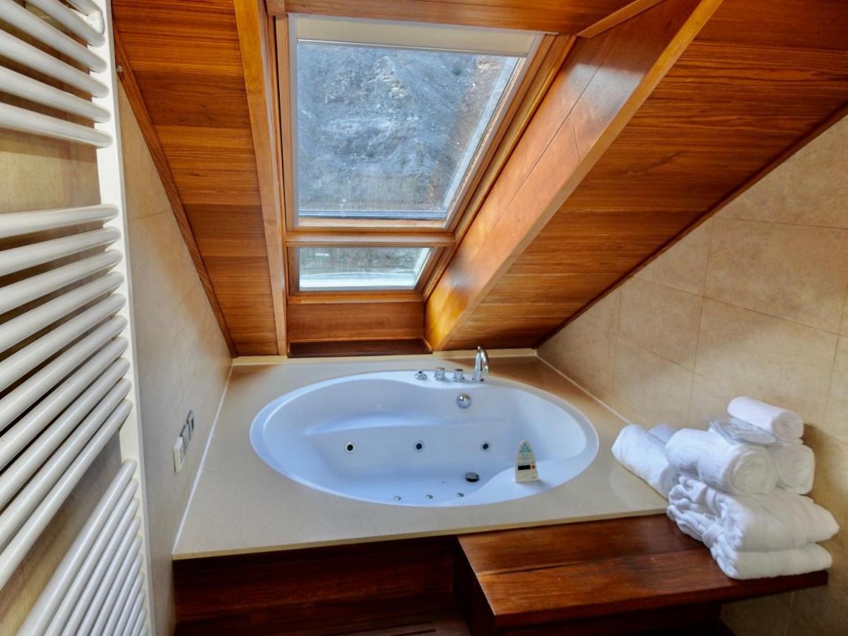 Suite con bañera de hidromasaje - Cama extragrande