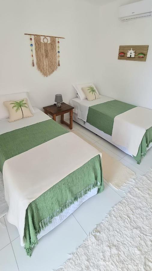 Quarto Triplo com Vista para a Piscina