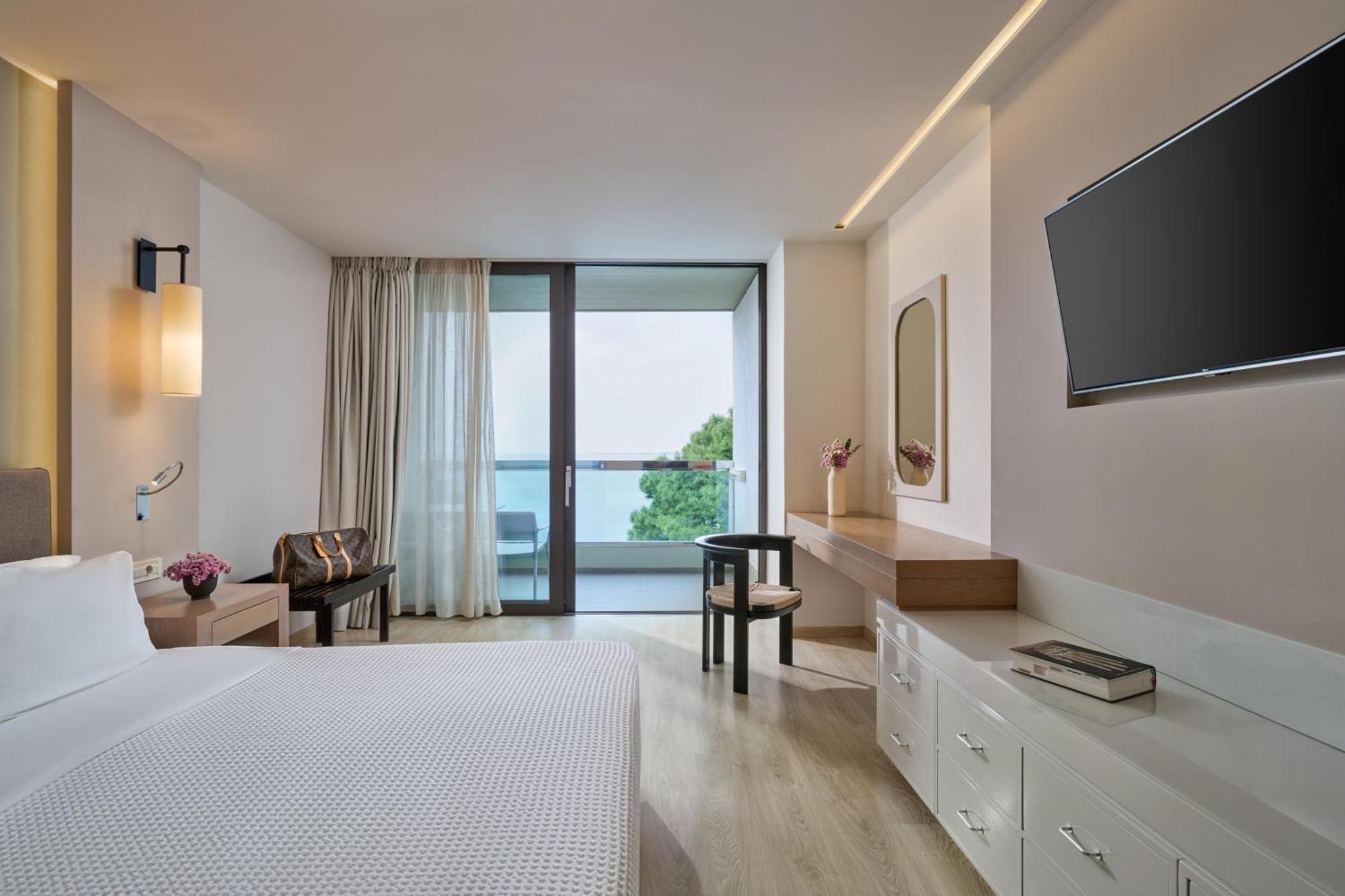 Tweepersoonskamer met 1 of 2 Bedden - Uitzicht op Zee
