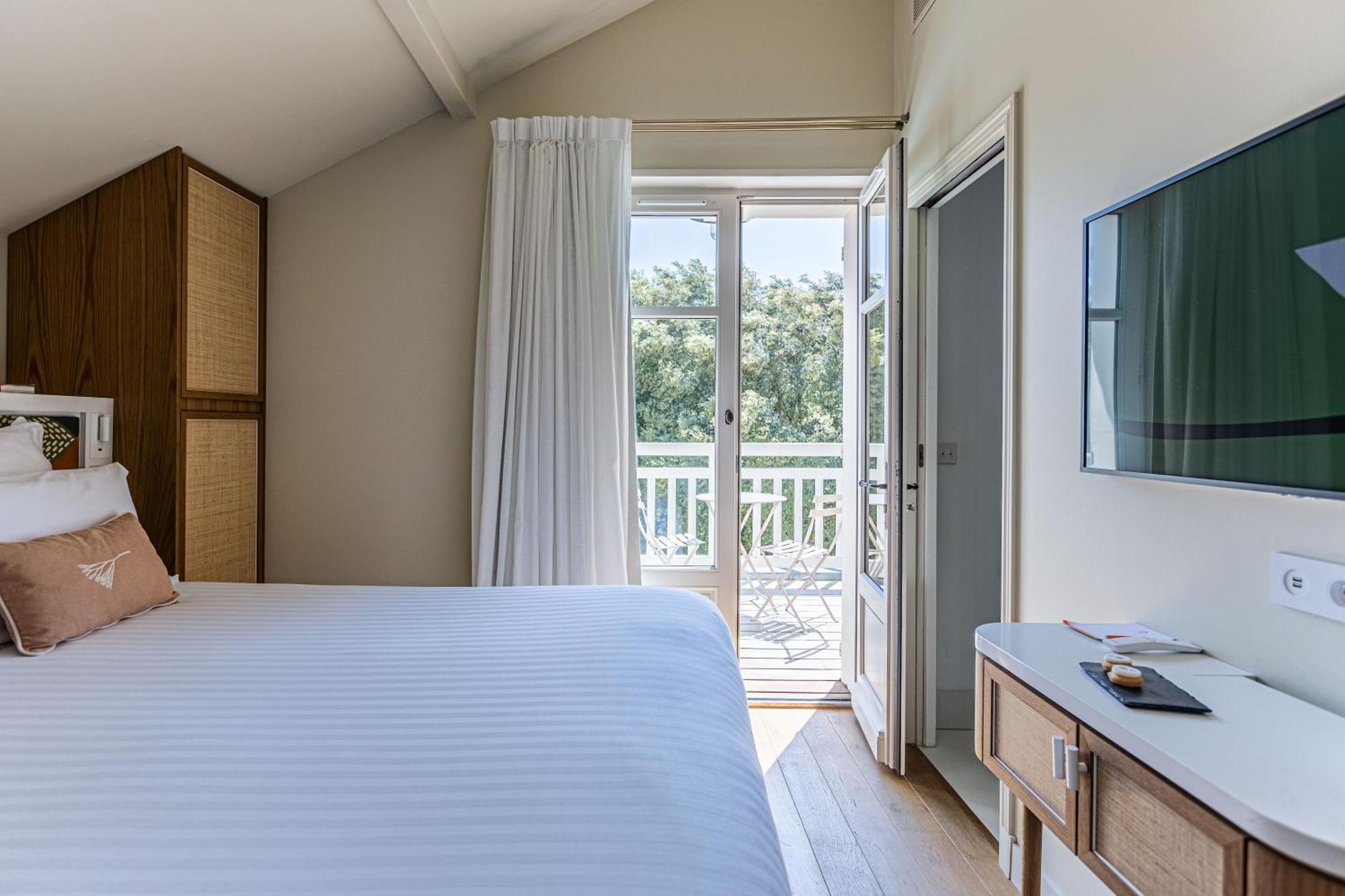 Double Room with Balcony or Terrace and Garden View,1559791672:JPEG