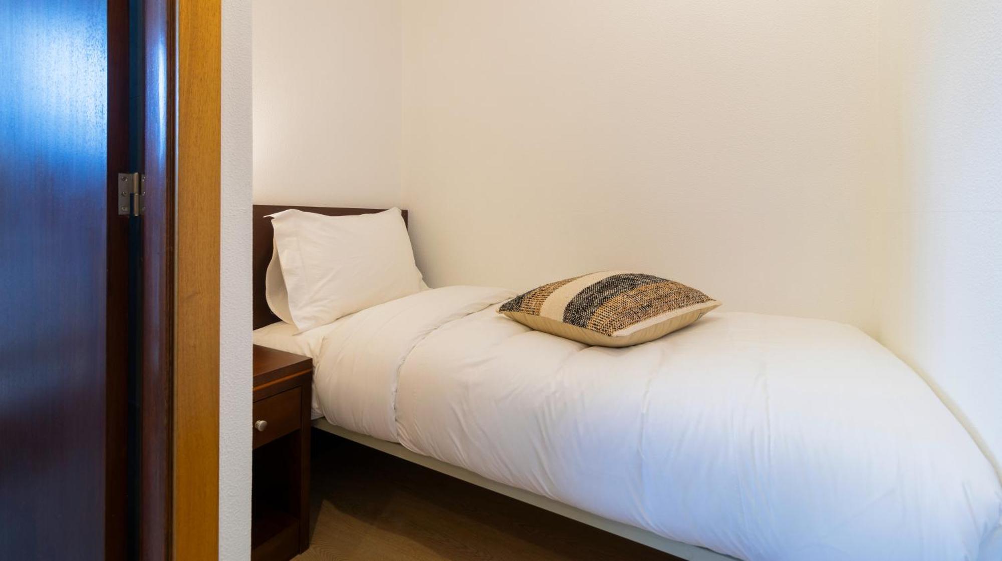 Quarto Triplo com Varanda