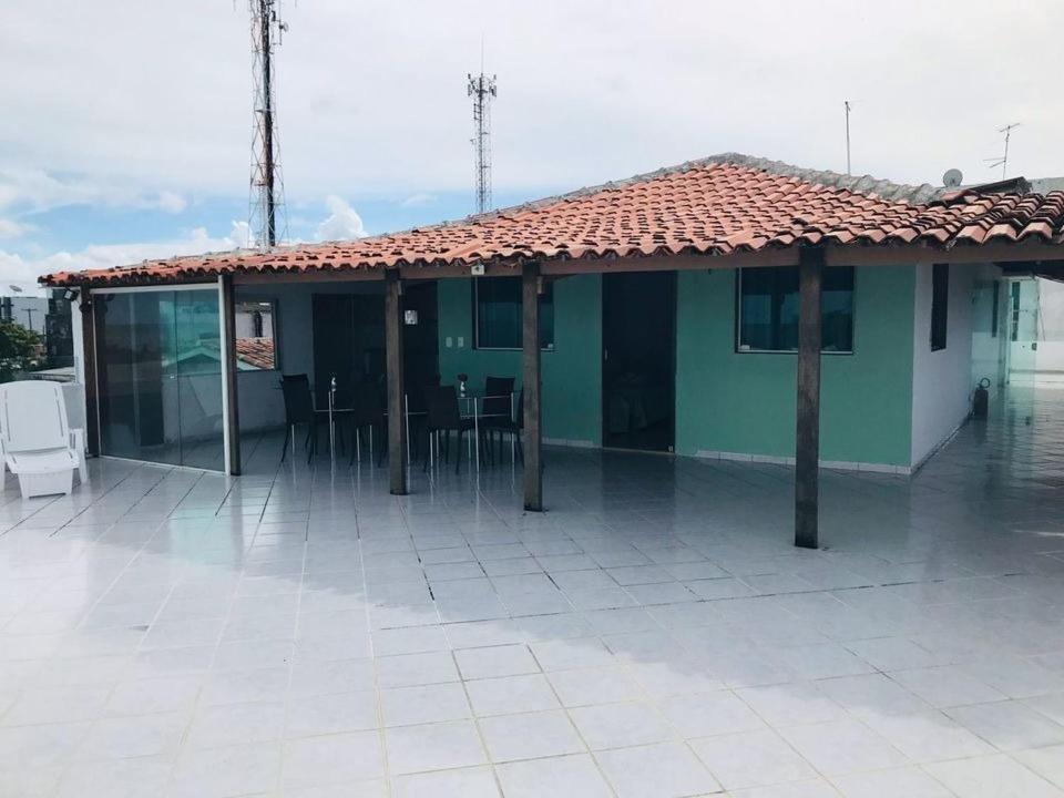 Quarto Quádruplo com Terraço