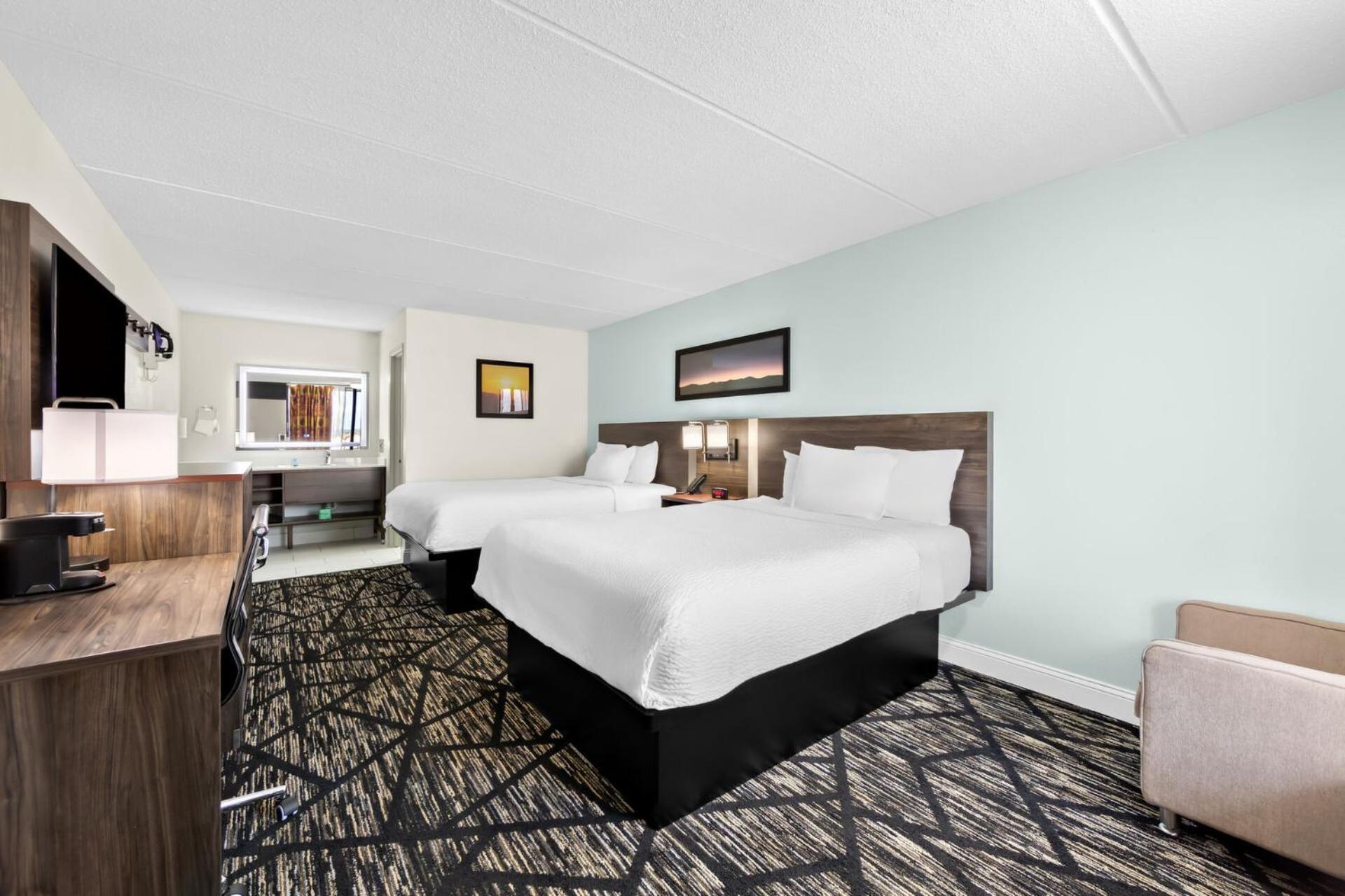 Quadruple Room with Two Queen Beds and Roll-In Shower - Disability Access/Non Smoking/Exterior Corridor