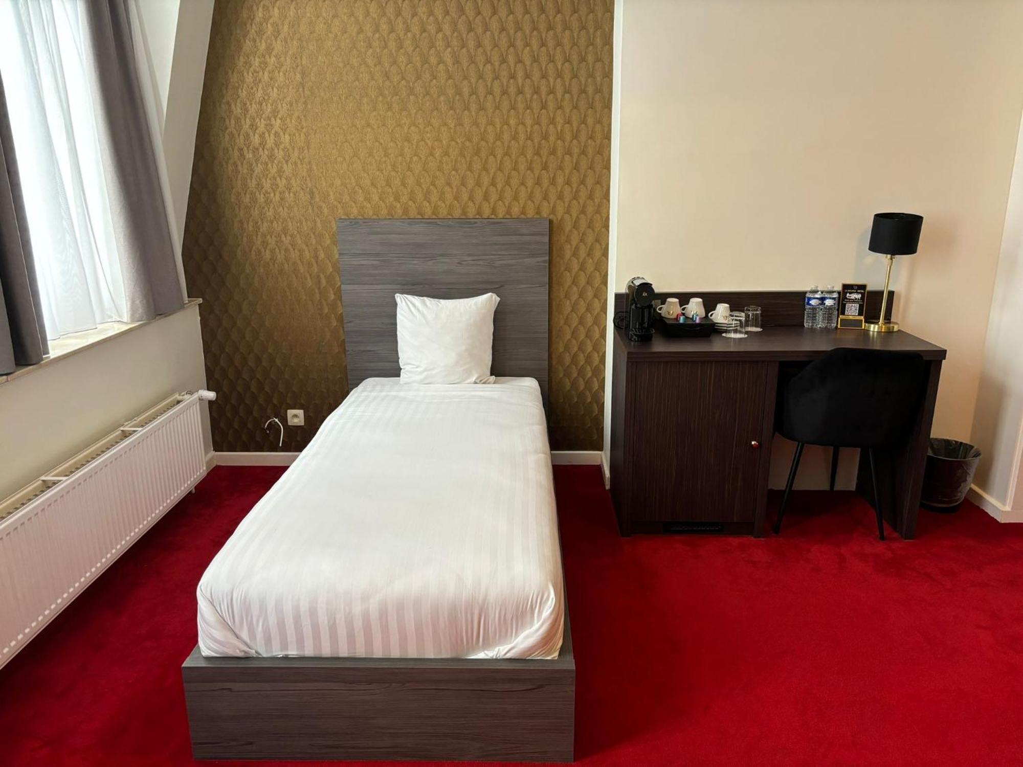 Chambre Triple - Vue sur Ville