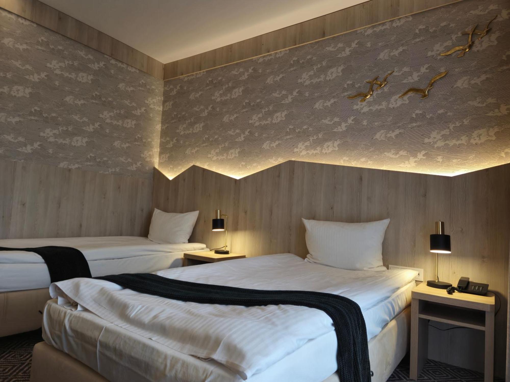 Deluxe Doppel-/Zweibettzimmer