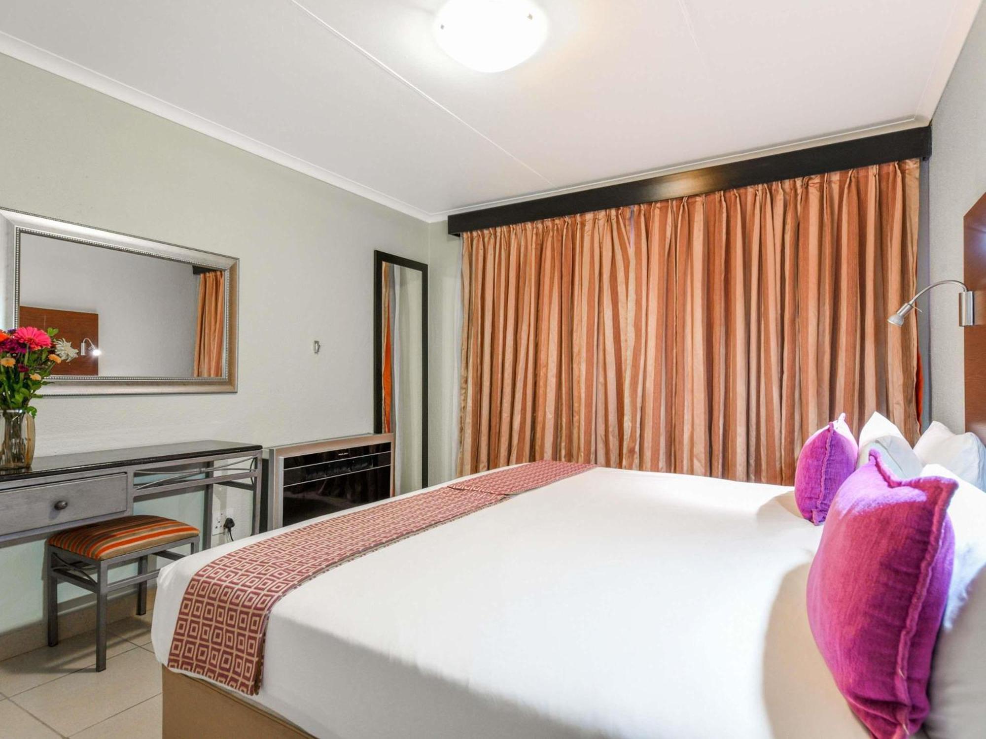 Superior Room with One Double and Two Single Beds