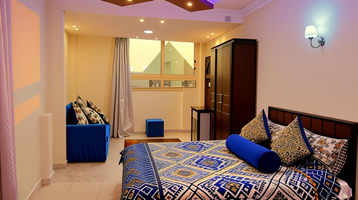 Chambre Lit Queen-Size Deluxe - Vue sur Pyramides