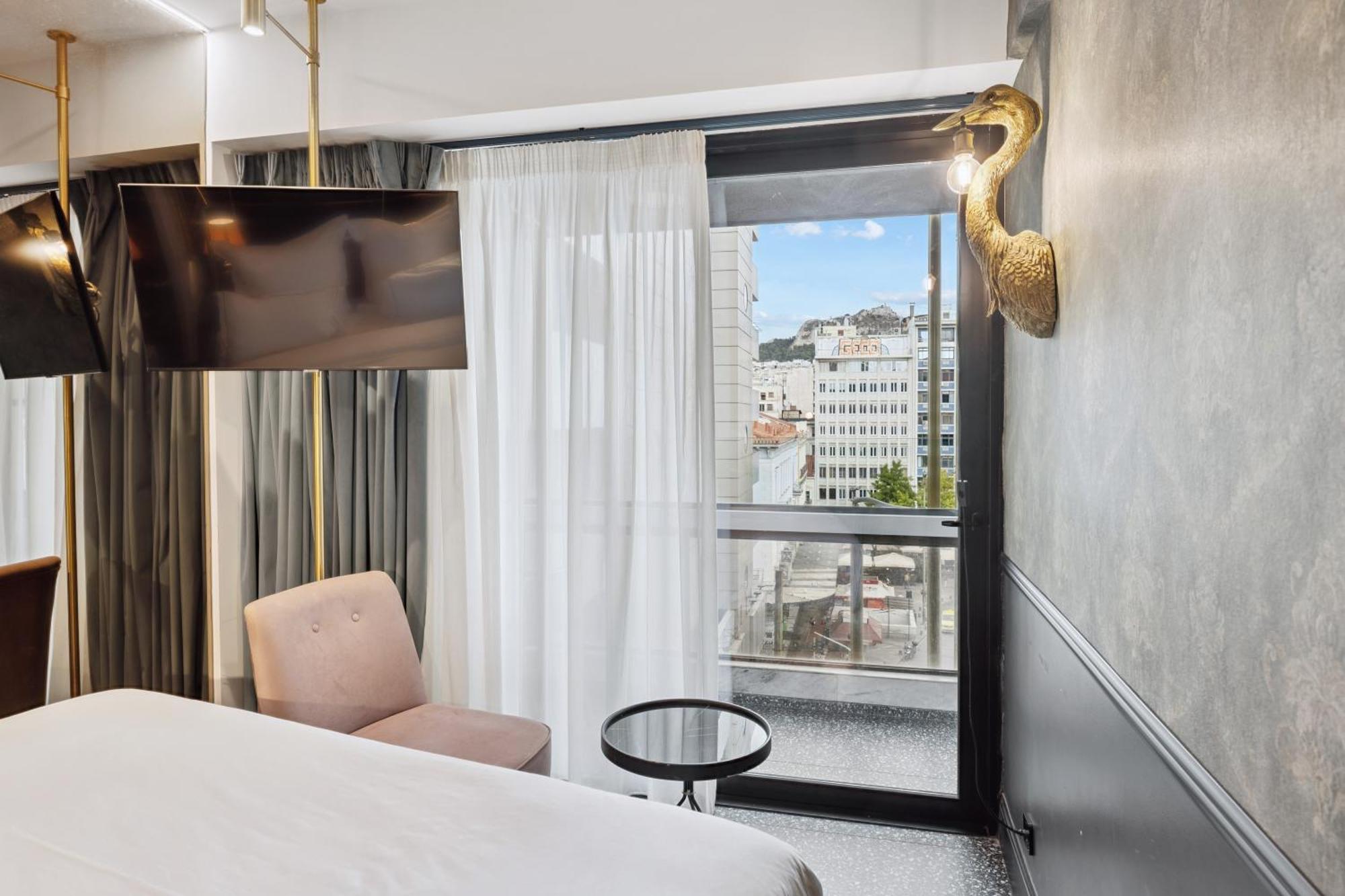 Savvy Kamer met Balkon en Uitzicht op de Stad
