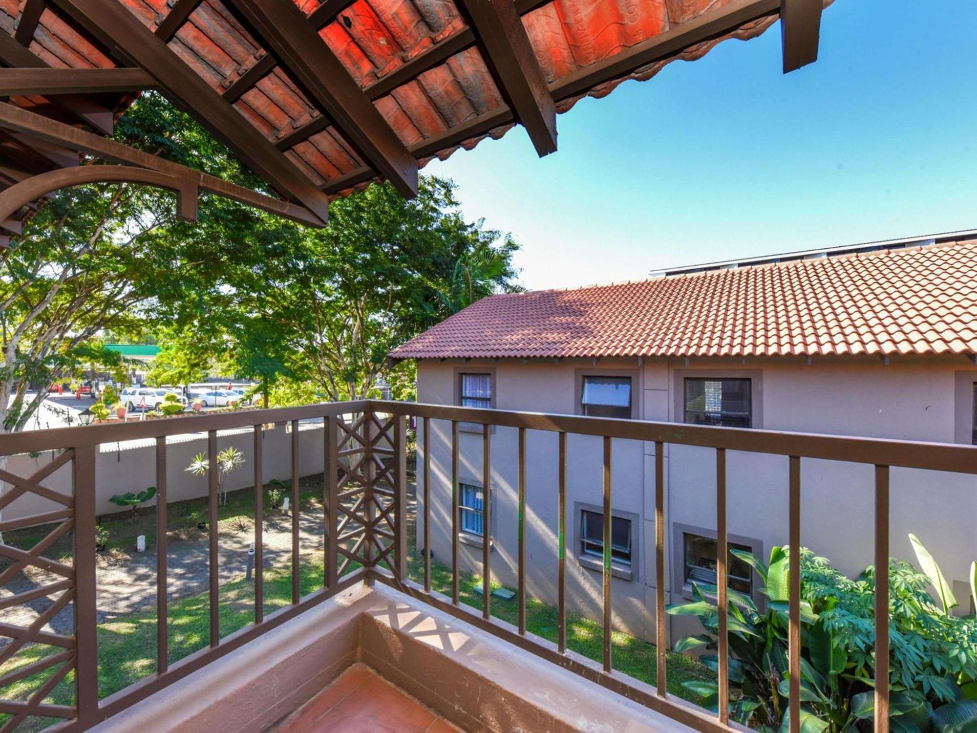 Superior Room with Balcony, One King and Two Single Beds