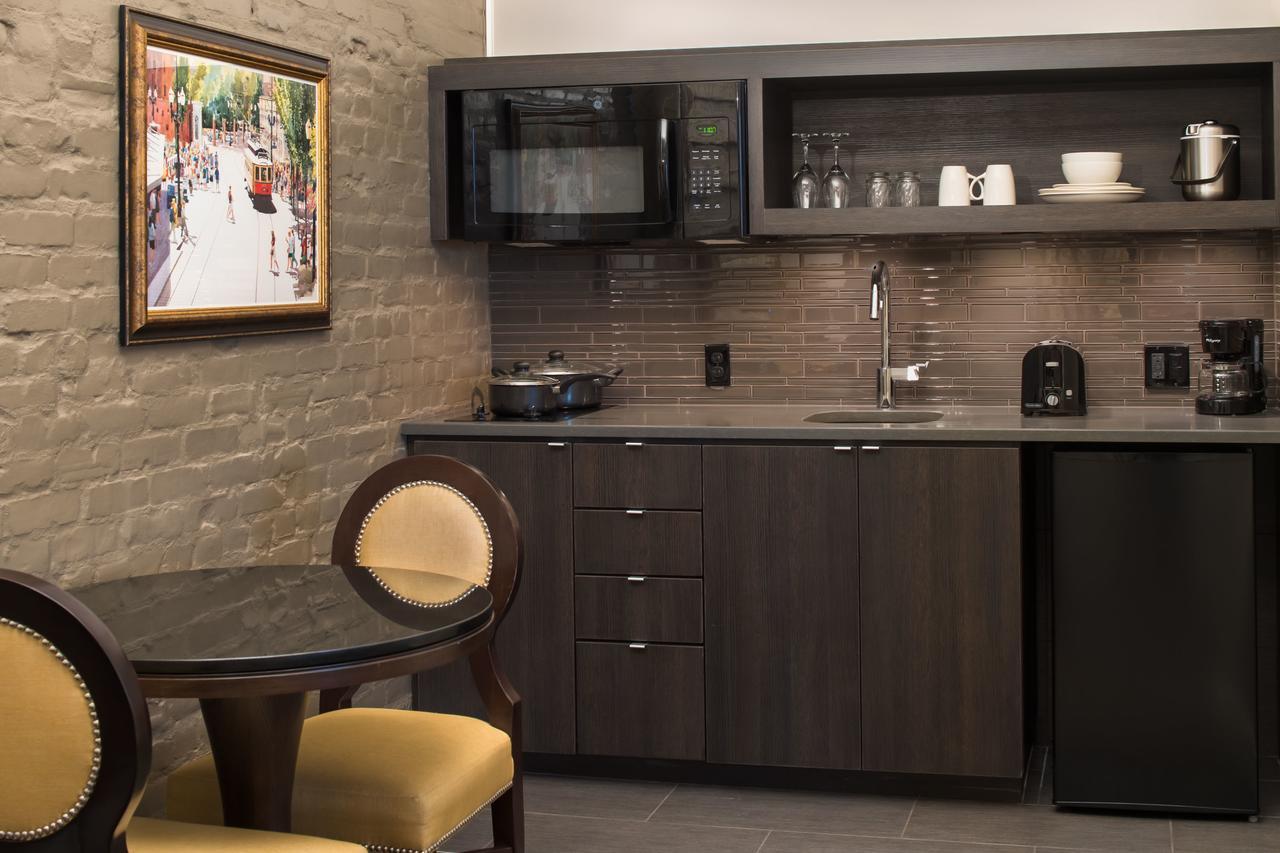 Alojamiento esquinero Premiere con cama extragrande y cocina