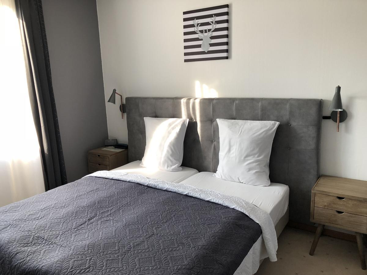 Doppel- oder Zweibettzimmer