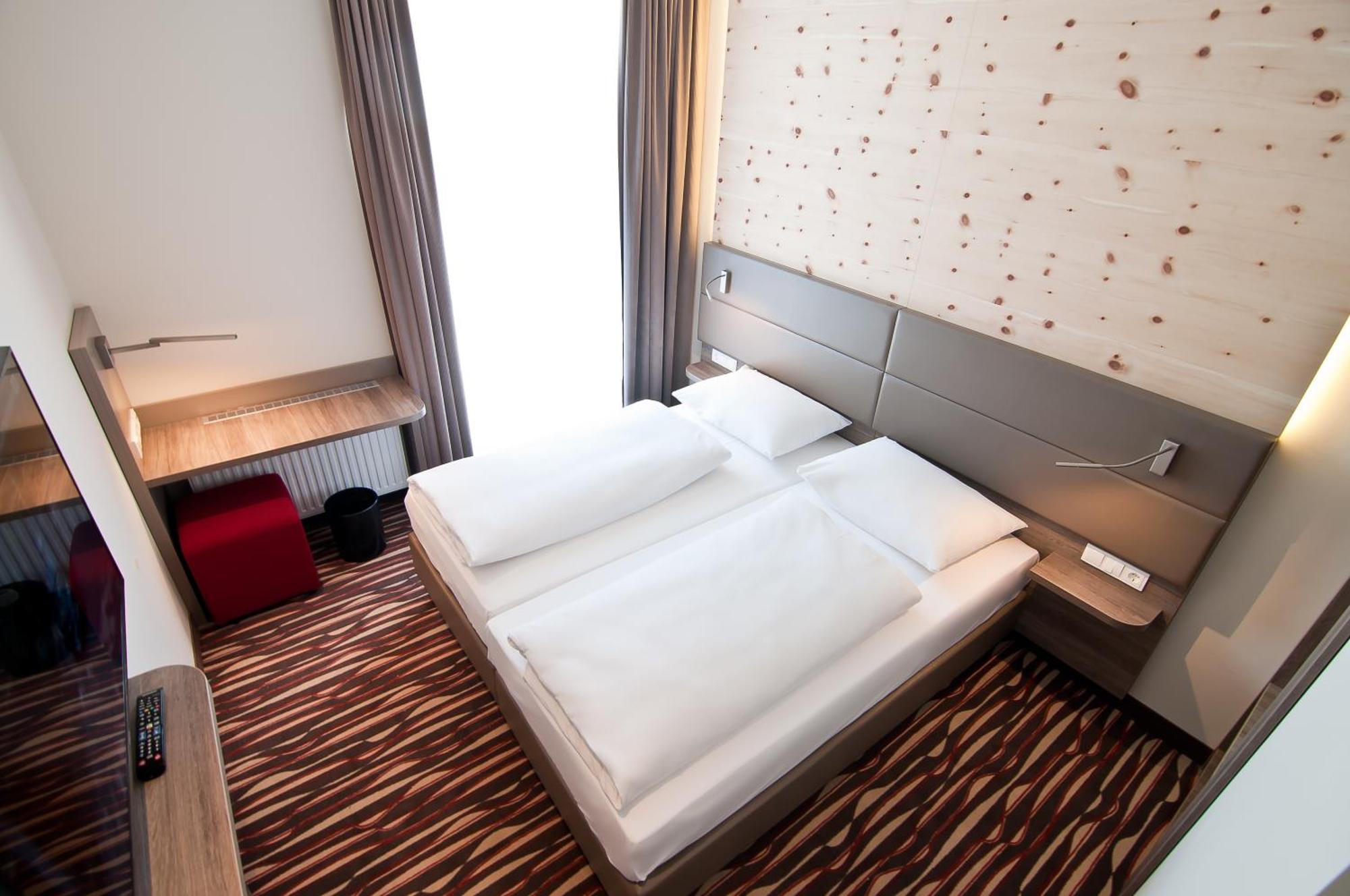 Comfort Doppel-/Zweibettzimmer mit Klimaanlage