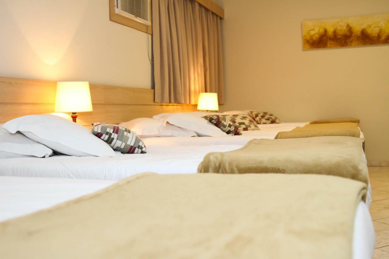Quarto Triplo com Varanda